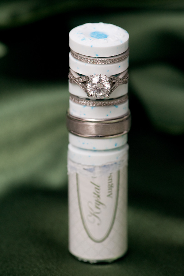 wedding rings layered between breath mints - photo by Houston based wedding photographer Adam Nyholt